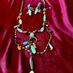 2 necklaces and clip on earrings